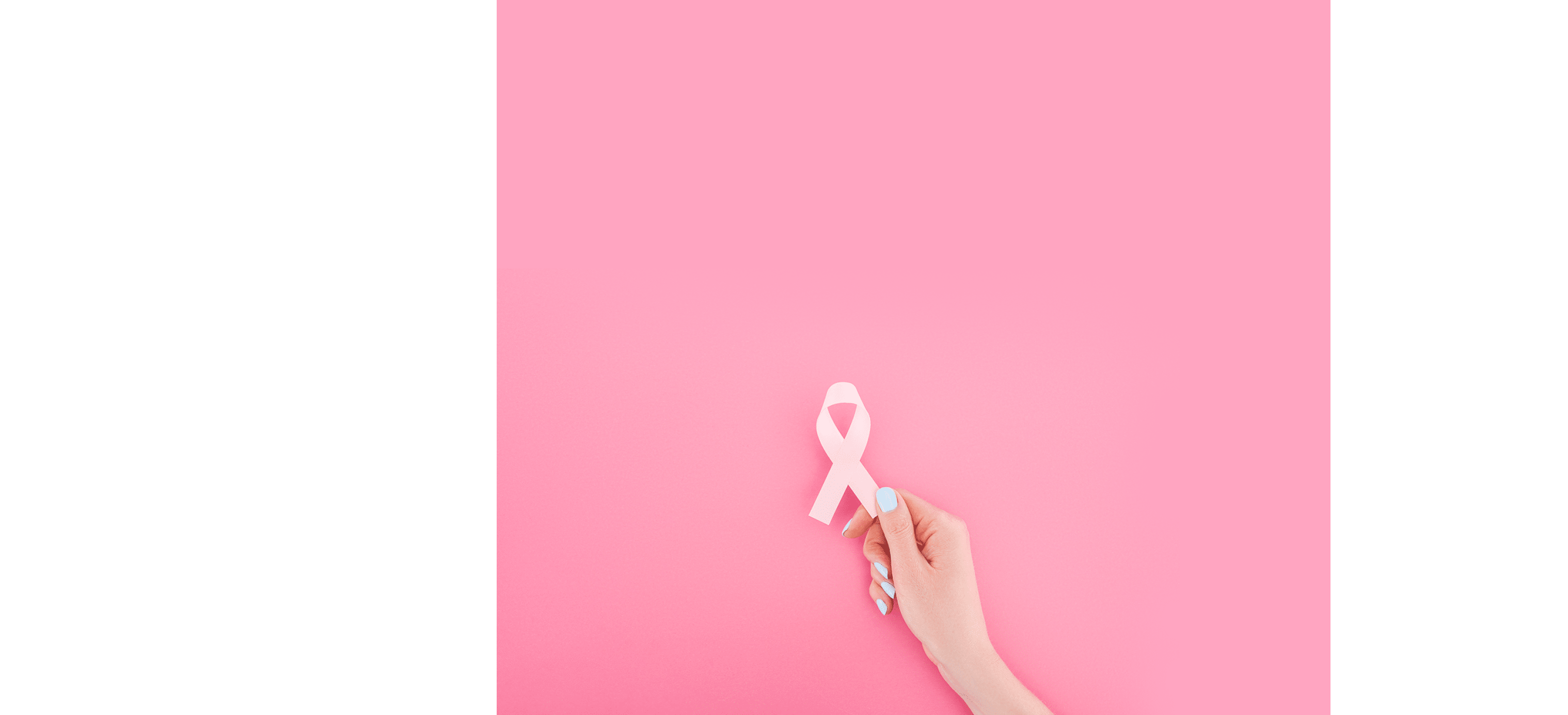 Lovely pleasant looking woman with happy expression, picks up curly hair in pony tail, has fun, glad to buy new striped sweater, being in good mood, poses at white studio  Beauty, youth concept