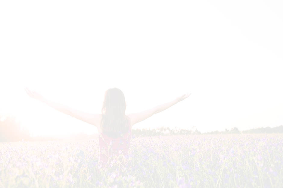 Free girl enjoying the nature on a beautiful flowery field